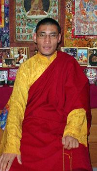 Rinpoche before a shrine